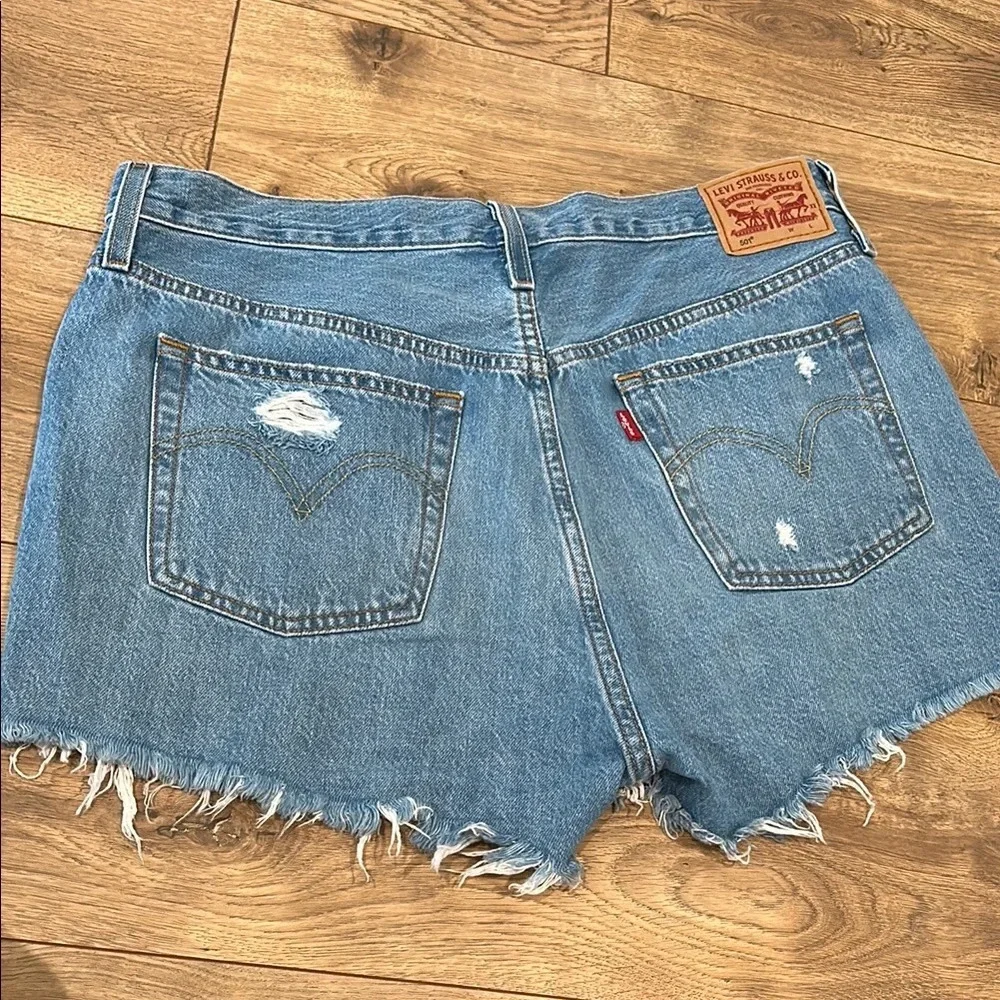 Levi's Blue High-Waisted Jean Shorts with Distressed Details 501